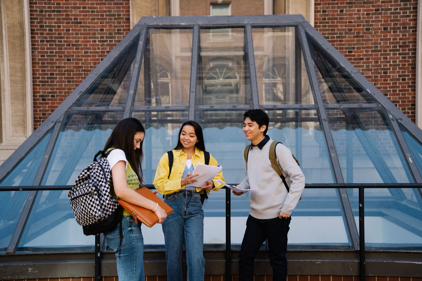 A group of students sharing a conversation outdoors