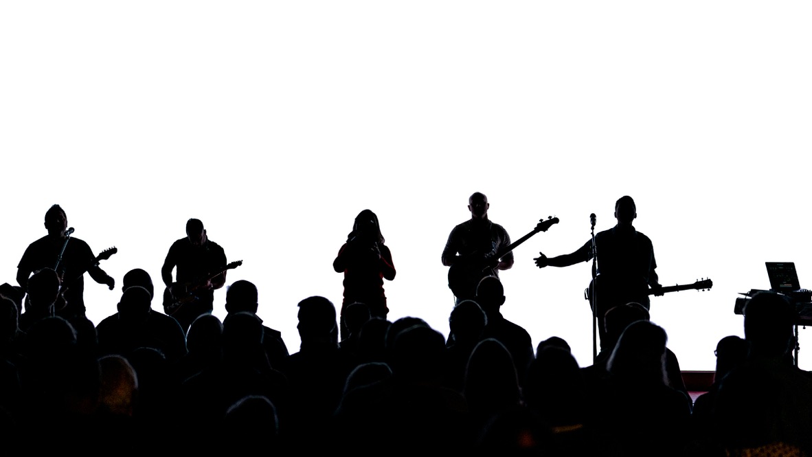Young musicians performing together in front of an audience